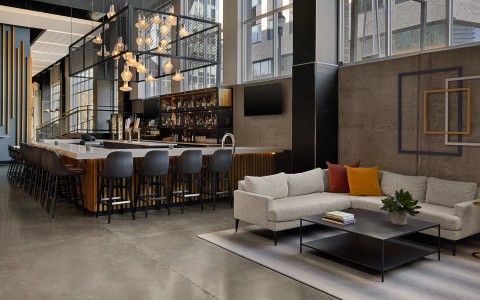 a room with a bar and a couch