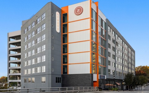 a building with orange and white accents