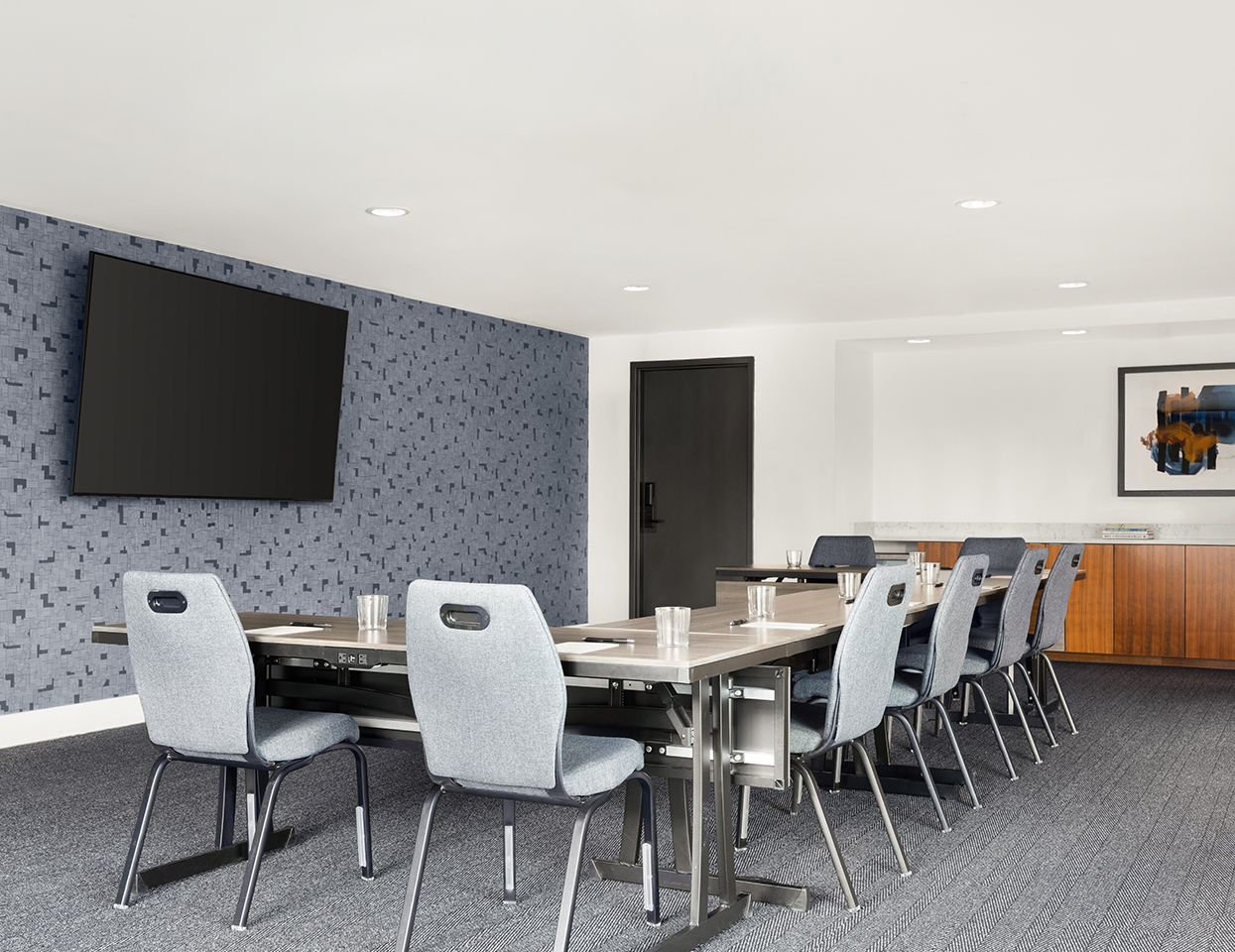 a room with a table and chairs