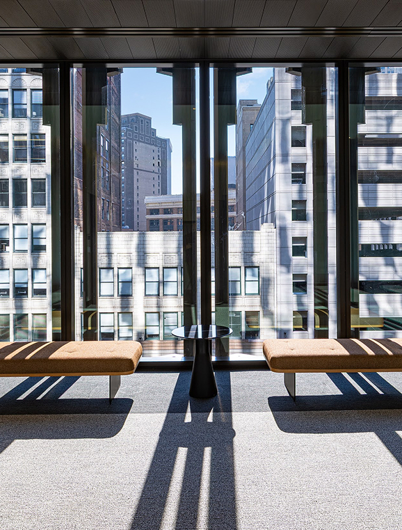 a room with a table and benches