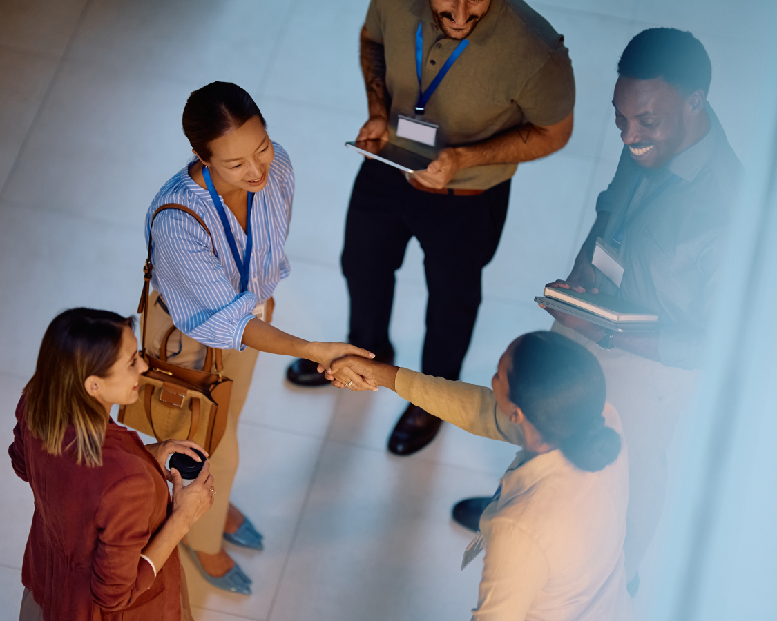 a group of people shaking hands