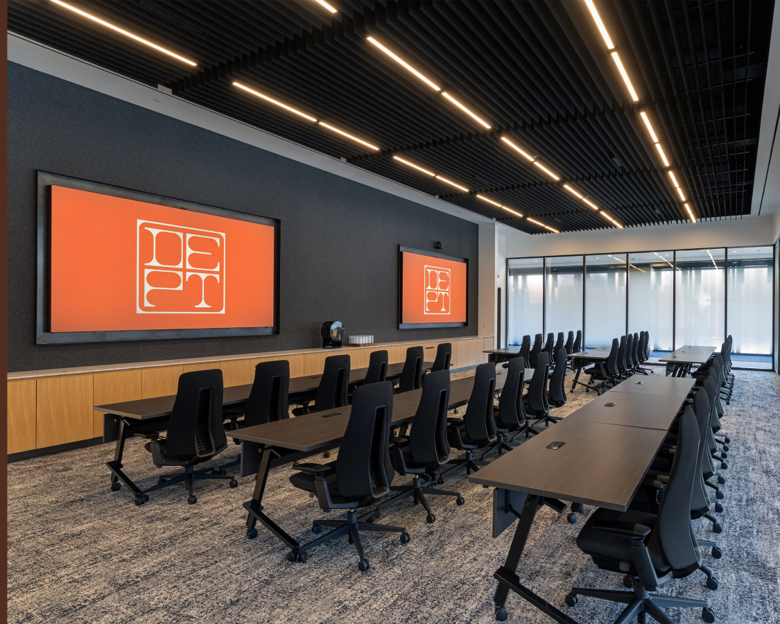 a conference room with tables and chairs