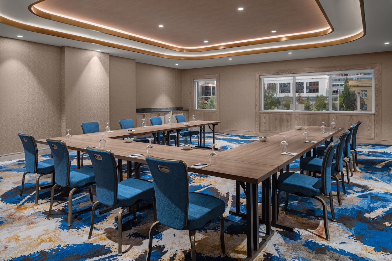 a room with a table and chairs