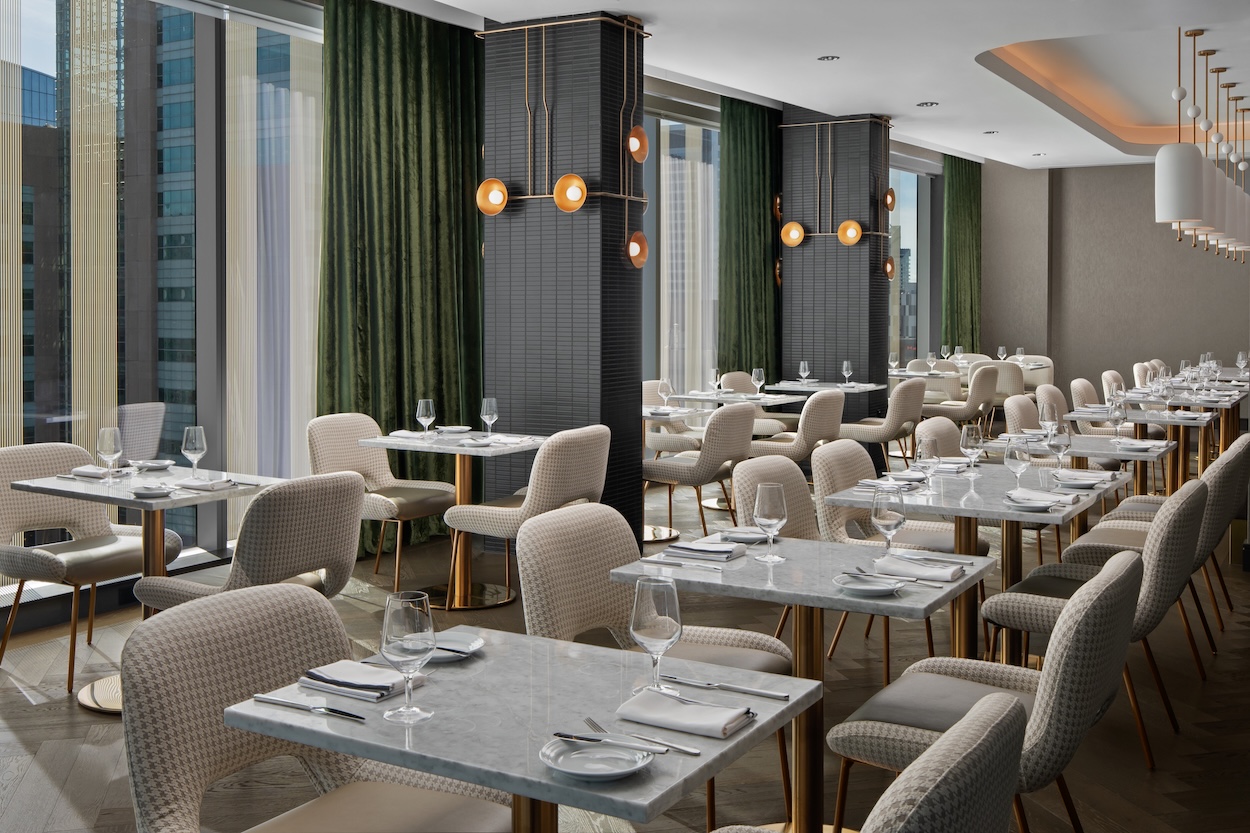 a room with tables and chairs