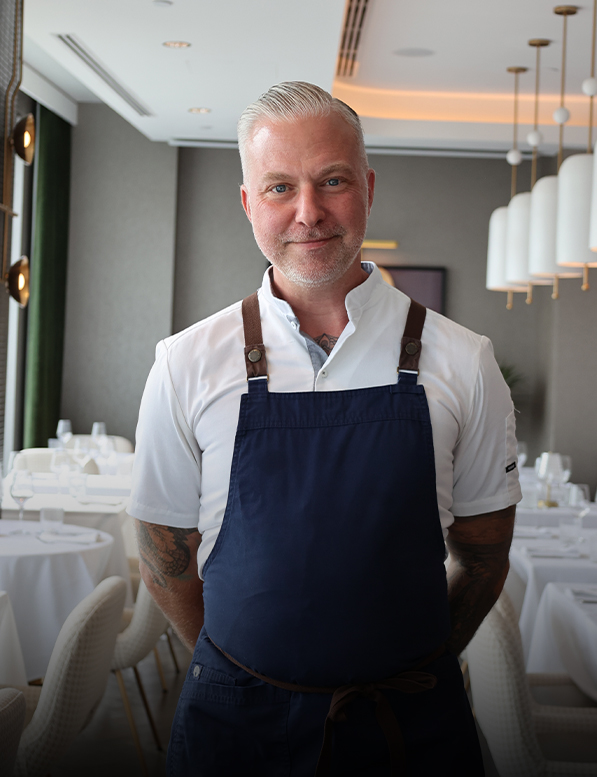 a man wearing an apron