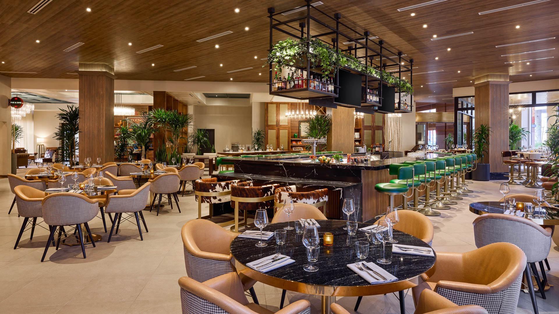 a restaurant with tables and chairs