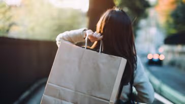 a woman holding a bag