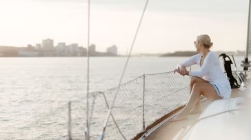 a woman sitting on a boat