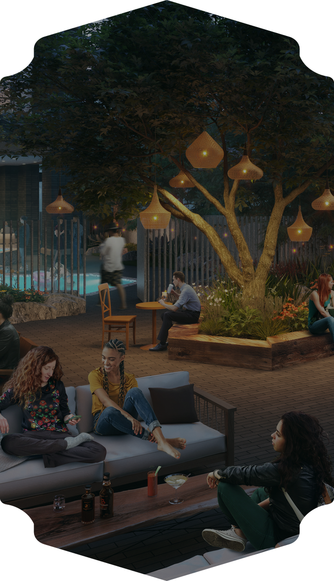 people sitting on a couch outside