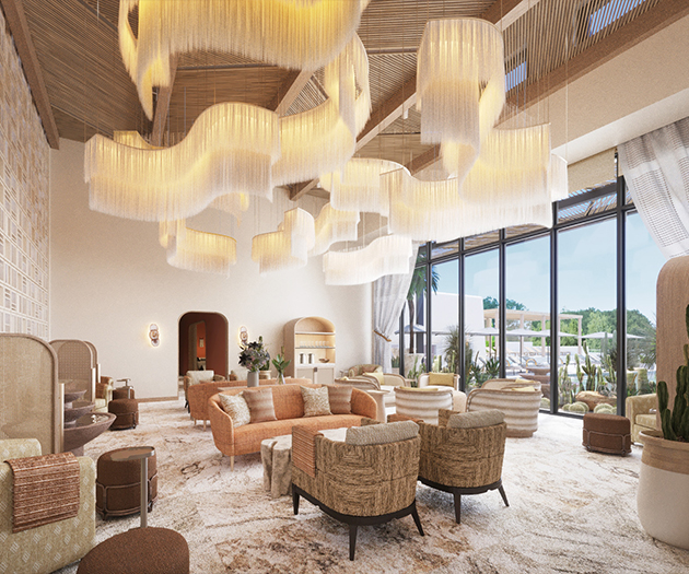 a room with a large chandelier and chairs