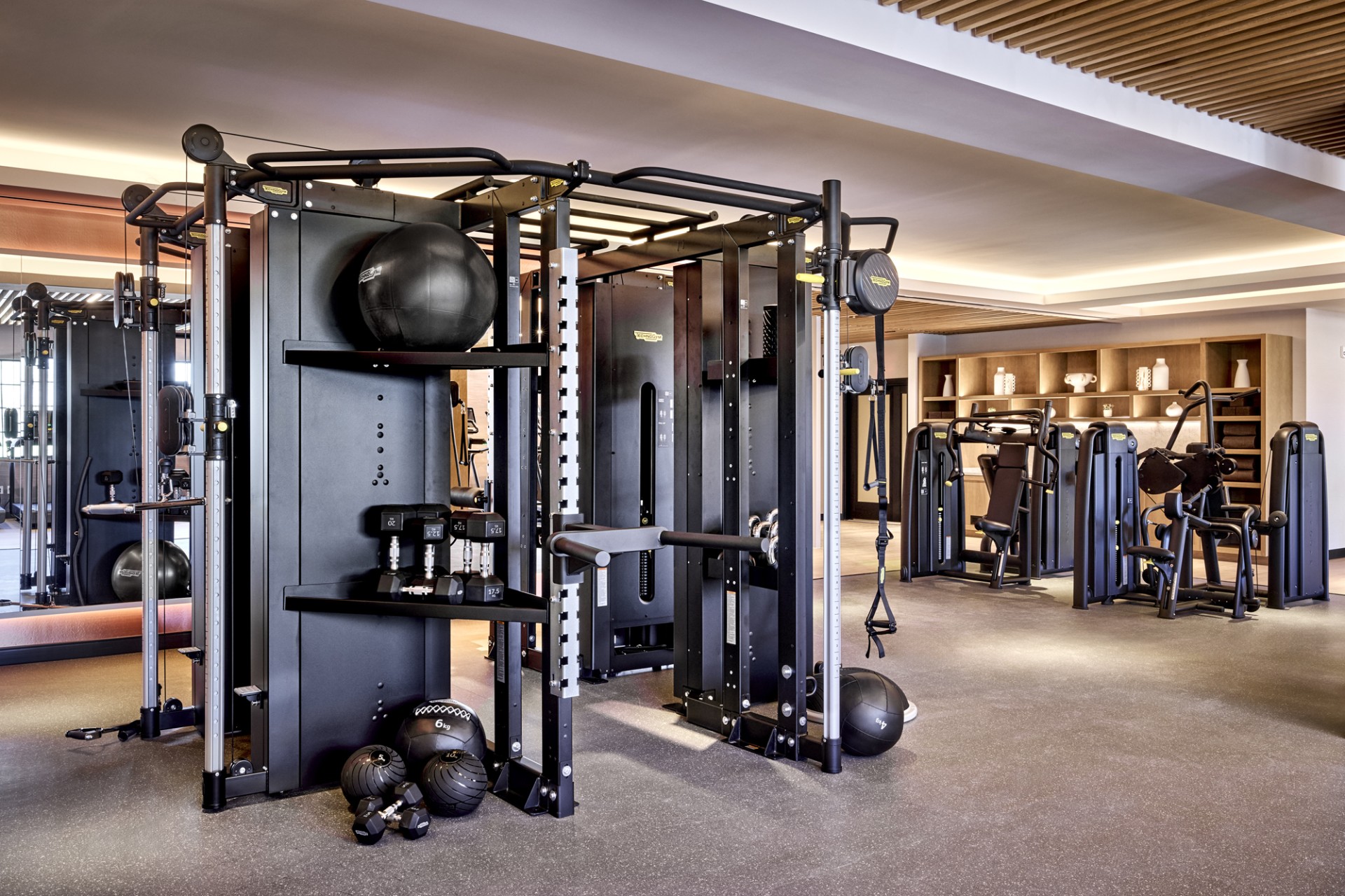a gym with weights and balls
