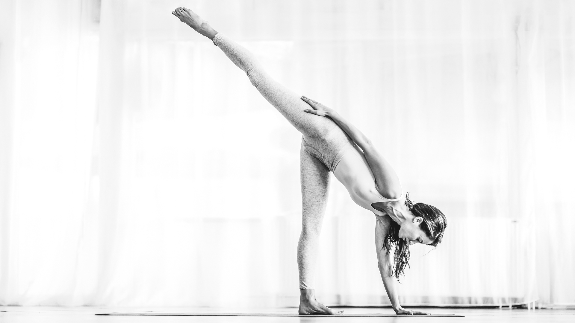 a woman stretching her leg