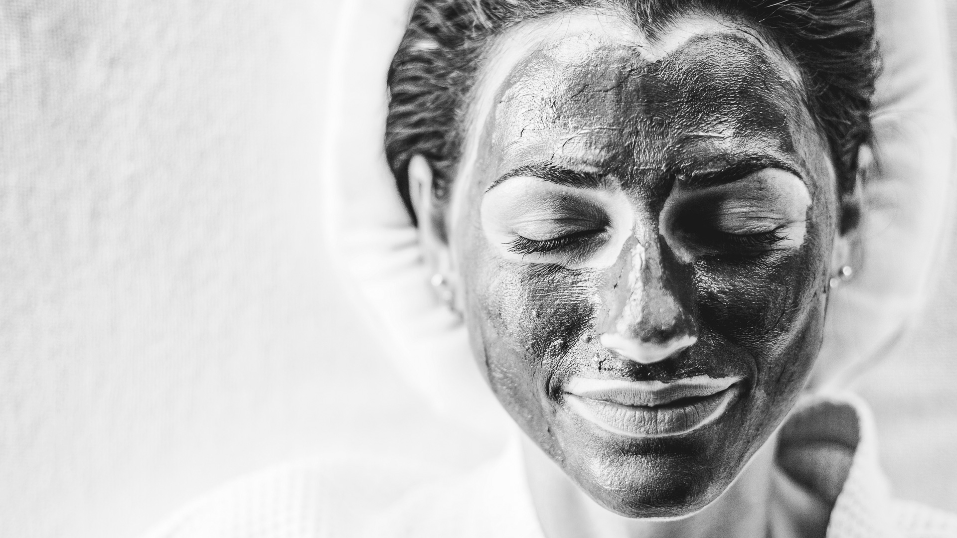 a woman with a mask on her face