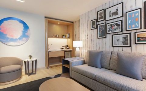 a living room with a couch and a table