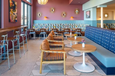 a room with tables and chairs