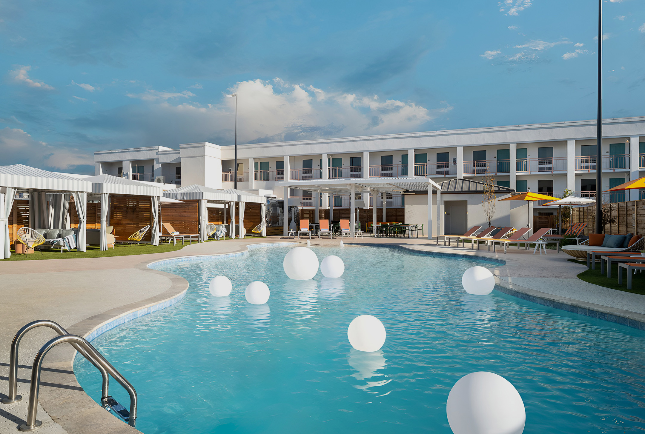 a pool with white balls in it